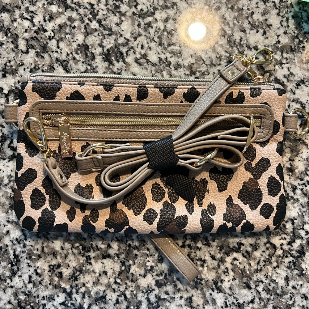 Itzy Ritzy Cheetah Pouch Wallet. Never been used.